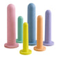NCPARTIES LLC Crescendo 6-piece silicone vaginal dilator set in assorted pastel colours with smooth rounded tips.