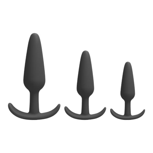 NCPARTIES LLC Endurance set of three black silicone anal plugs in small, medium, and large sizes with curved bases.